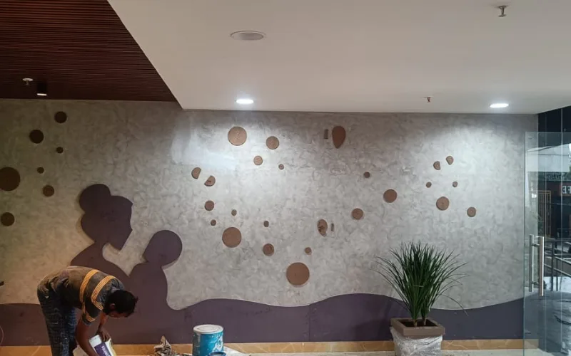 Luxury interior living room with designer texture accent wall in Rajahmundry